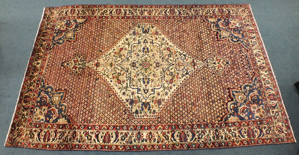 Bakhtiari rug, West Persia,
the lattice field centred by a pole medallion framed by meandering