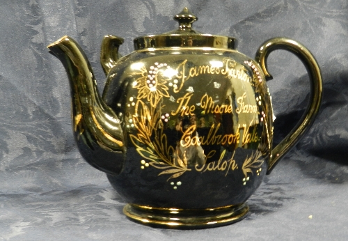 A Victorian novelty teapot of Shropshire interest with three spouts and decorated in gilt 'James