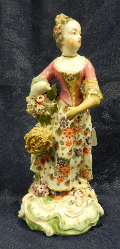 An 18th century Derby porcelain figure of 'Autumn' (AF)