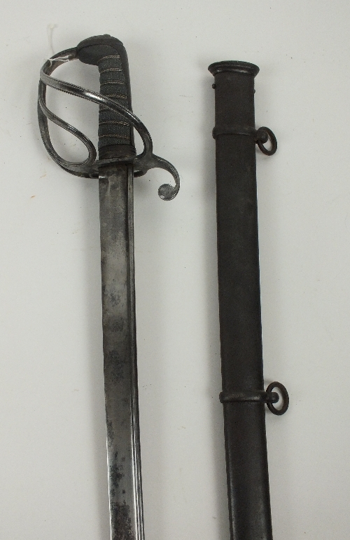 An 1821 pattern British Light Cavalry Sword, slightly curved blade with flat back, single broad