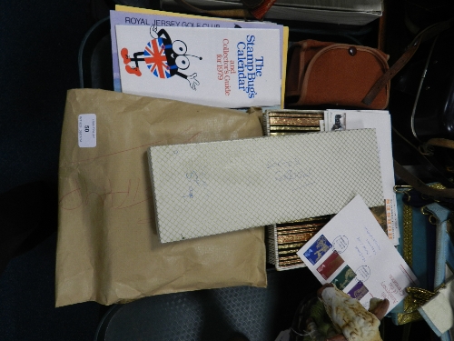 A quantity of stamps in two stock books and loose together with a Kodak Retinette IIB