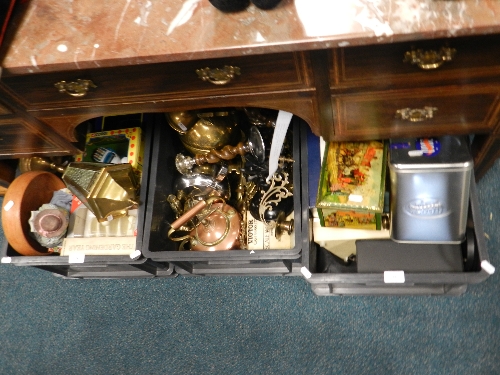 An assortment of copper and brass wares together with decorative tins and various ceramics