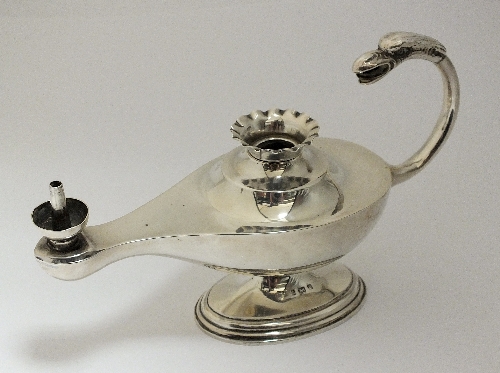 A Victorian silver club lighter, makers marked rubbed, Birmingham 1900, the Aladdin style lamp