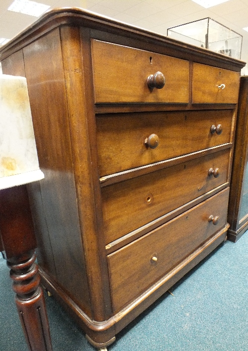 A Victorian mahogany chest of two short and three long drawers on plinth base