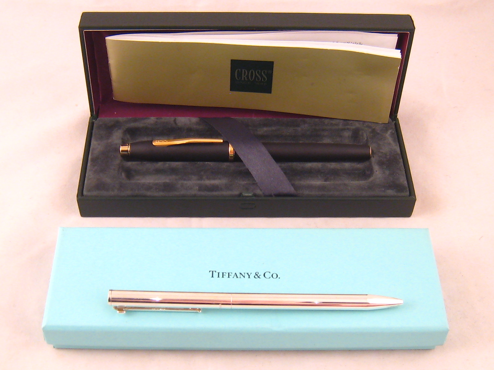 A Tiffany & Co hallmarked sterling silver ballpoint pen, London 2006, in pouch and box, together