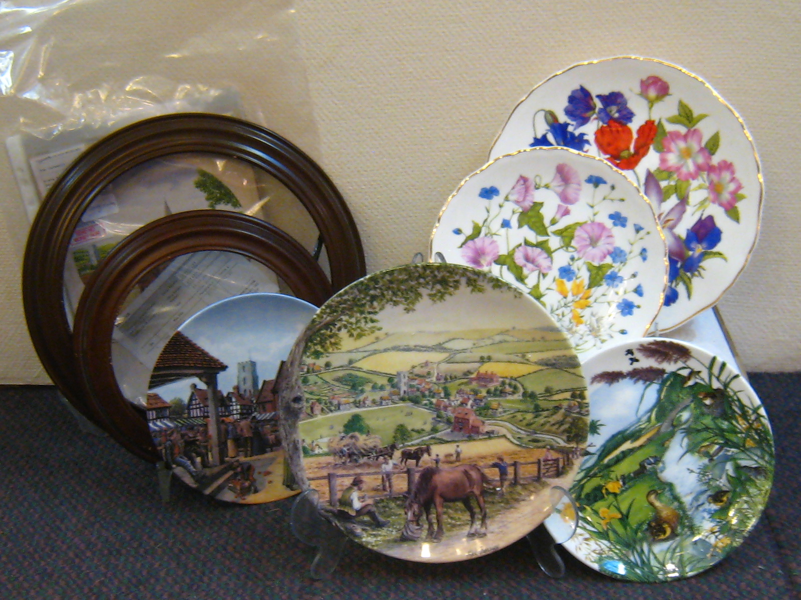 Four sets of limited edition collector's plates complete with certificates. Including; set of 8