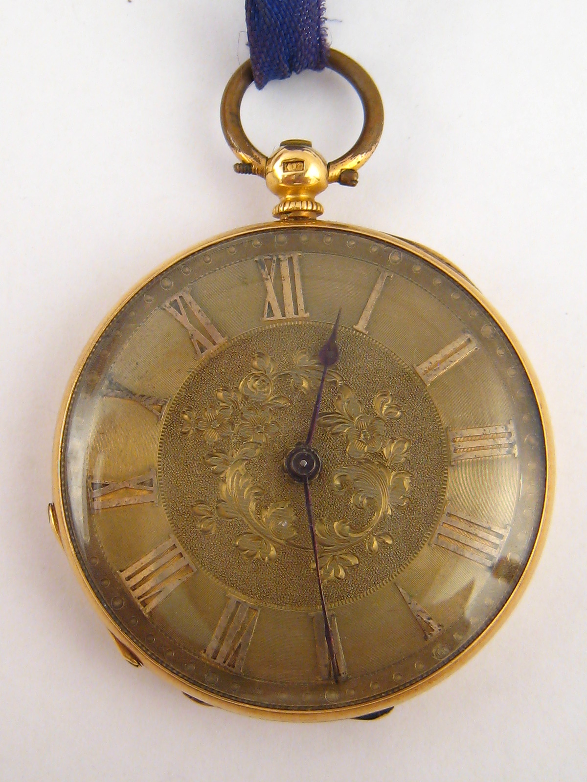 A 19th century 18 carat gold cased open face pocket watch (metal dust cover), case approx 37mm wide,