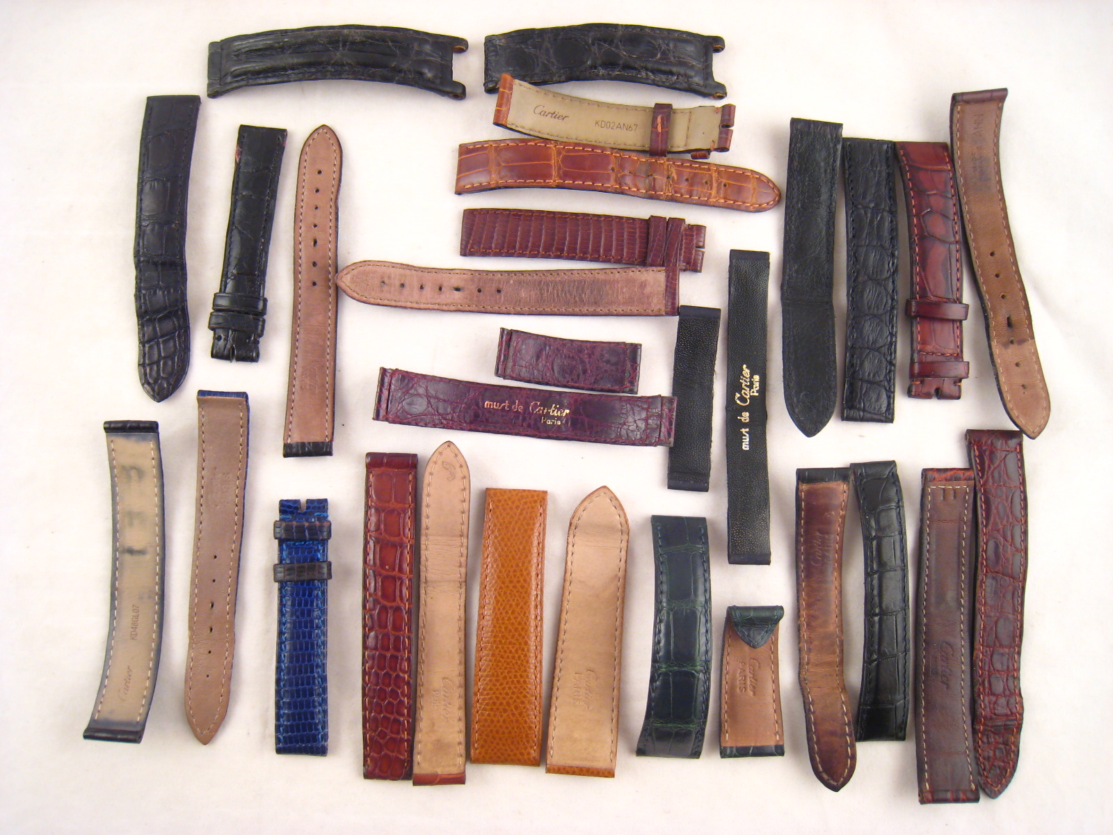 Cartier. A quantity of vintage Cartier wrist watch straps.