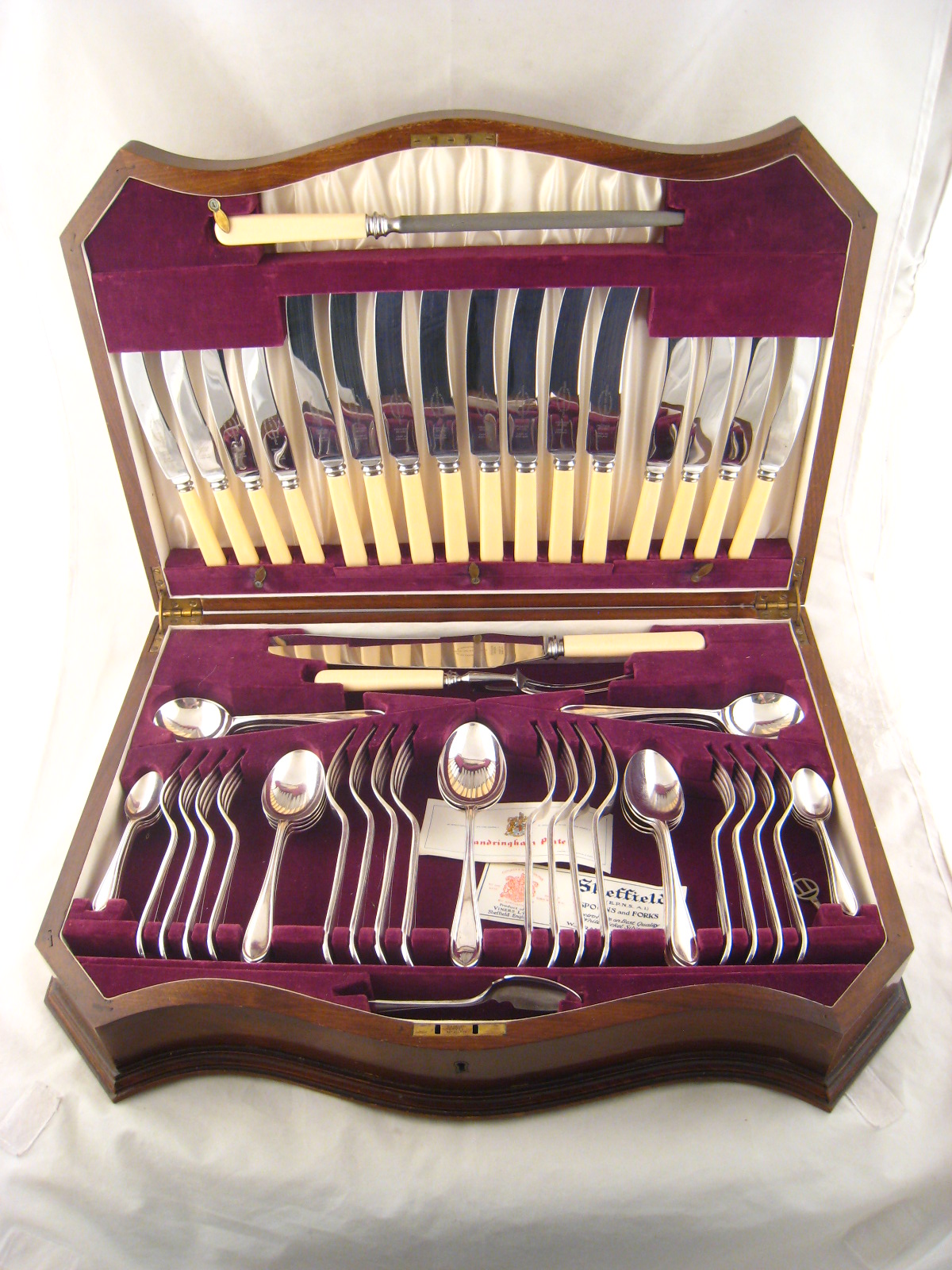 A set of Viners Sandringham pattern silver plate flatware in shaped fitted walnut case, comprising