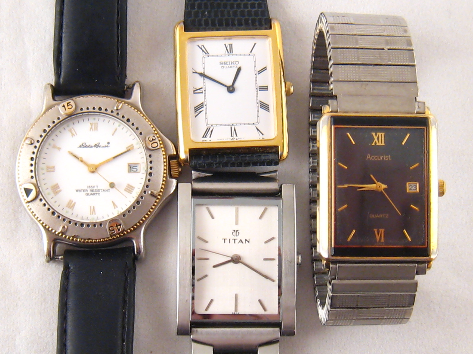 Four gent's watches by Seiko, Accurist, Eddie Bauer and Titan.