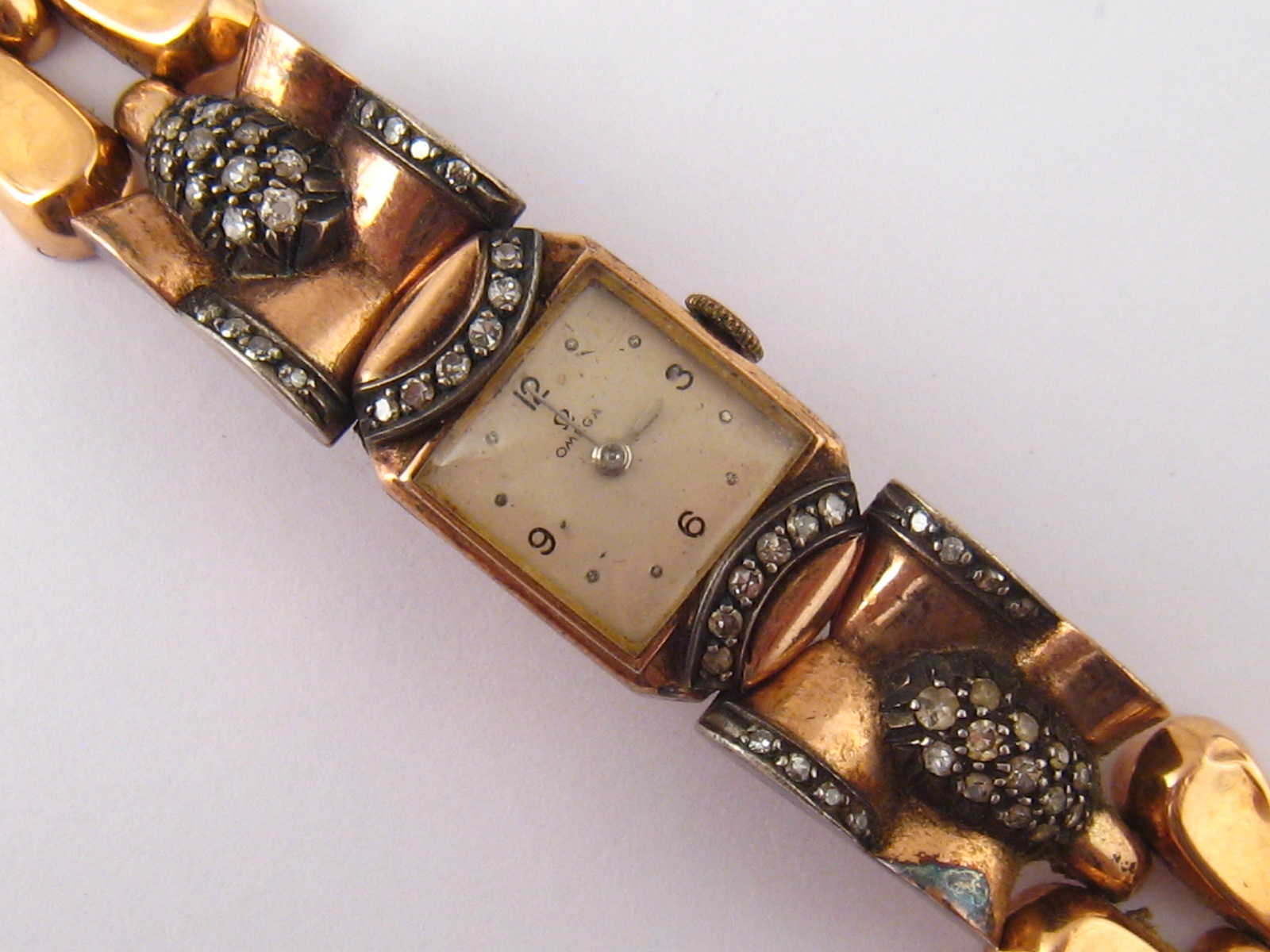 A lady's 18 carat gold and diamond Omega cocktail watch , mechanical movement signed Omega and