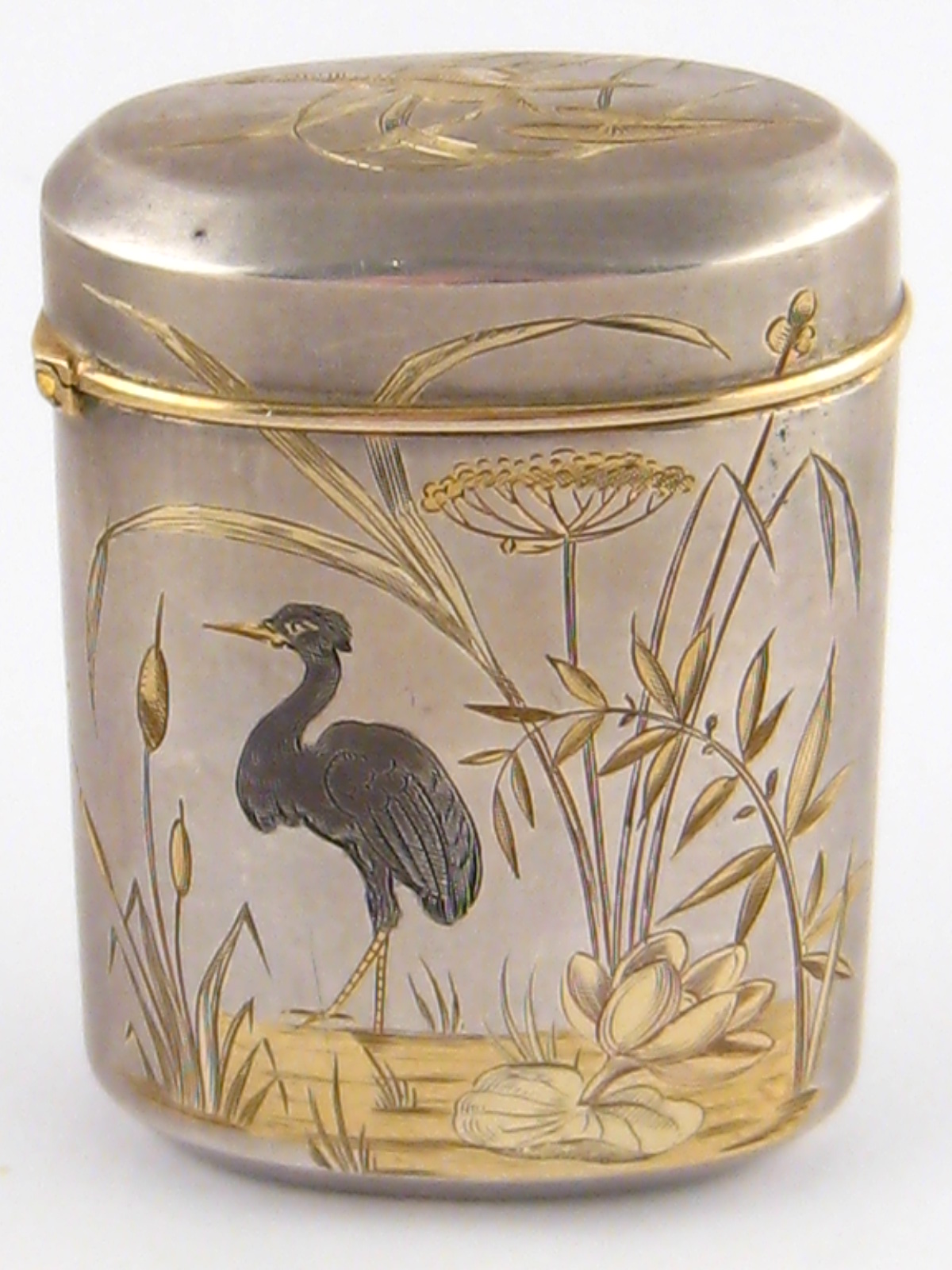 A French hallmarked silver box with gilt interior, decorated in the aesthetic manner, circa 1880,