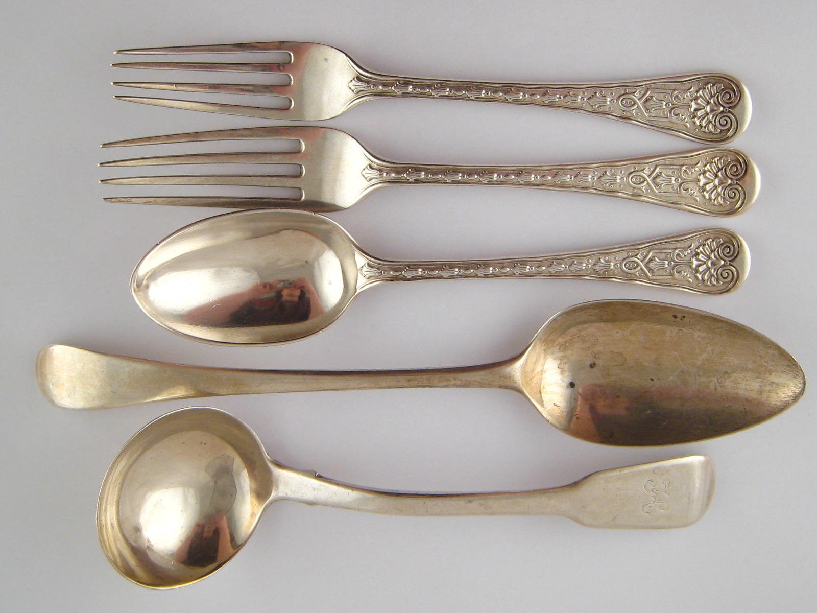 Silver.Two table forks and one dessert spoon, Elizabethan pattern, Carrington & Co. London, spoon