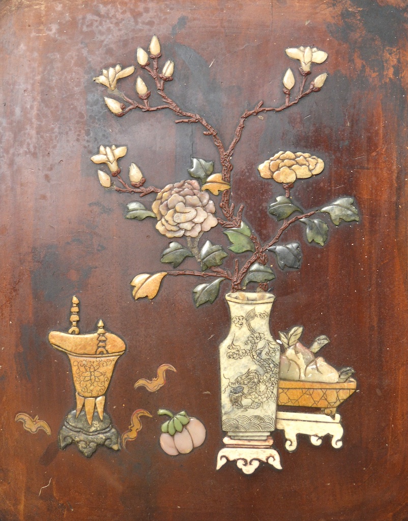 A 19TH CENTURY CHINSE LACQUER AND HARDSTONE PANEL depicting foliage and precious objects. 1ft