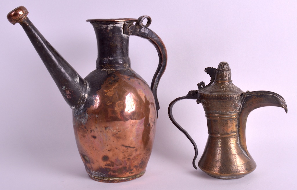 A 17TH CENTURY ISLAMIC PLAIN COPPER EWER Persia, together with an 18th century engraved Safavid