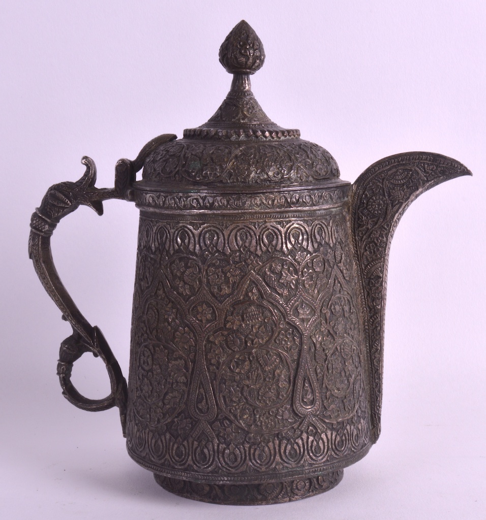 AN 18TH CENTURY SAFAVID SILVERED BRONZE JUG decorated all over with extensive floral landscapes, the