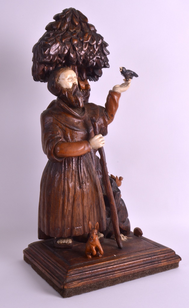 AN UNUSUAL 19TH CENTURY SOUTH GERMAN FOLK ART FIGURE OF A MALE with ivory hand and head, modelled