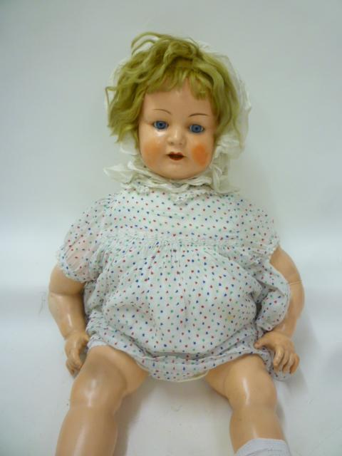 Dolls & Equipment. A Kammer & Reinhardt composition character doll with blue glass sleeping eyes,