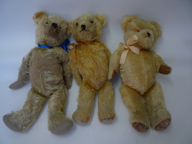 Teddies & Soft Toys. An English teddy bear, early to mid 20th century, covered in gold plush with