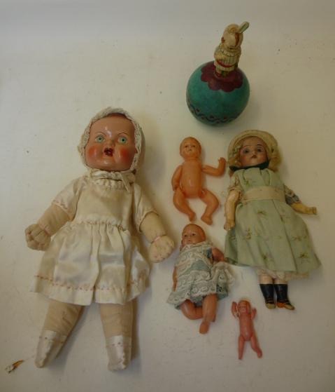 Dolls & Equipment. A German bisque head doll with fixed blue glass eyes, open mouth and teeth,