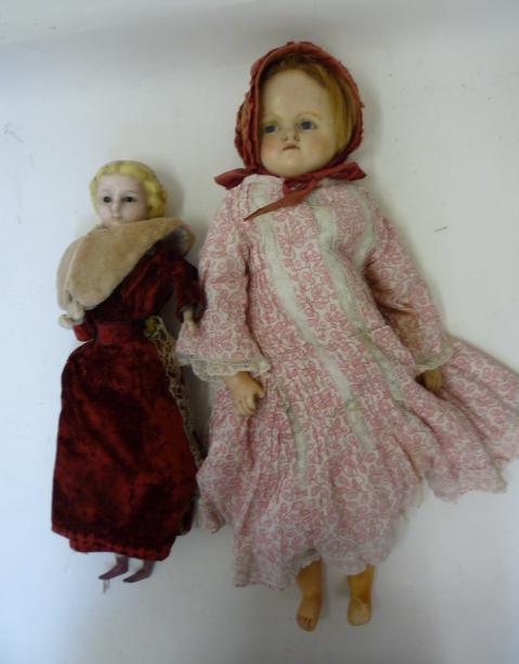 Dolls & Equipment. An English wax shoulder head doll with fixed blue glass eyes, inbedded blonde