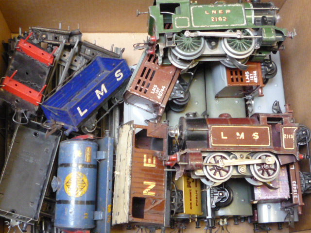 Model Railways. A quantity of Hornby trains and wagons including Hornby electric 0-4-0 L.N.E.R. tank