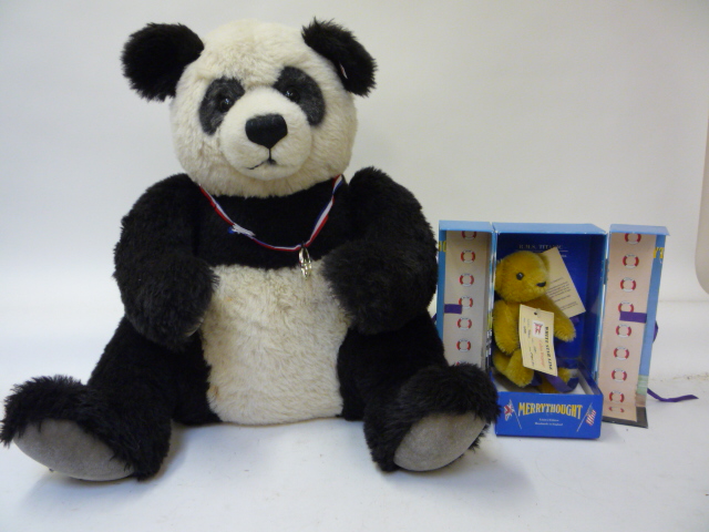 Teddies & Soft Toys. A Steiff Giant Panda with ear stud and embroidered bag, 20" high, and a