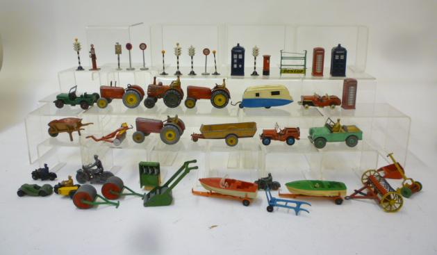 Diecast Vehicles. Four Dinky tractors, sixteen various agricultural and other models and a