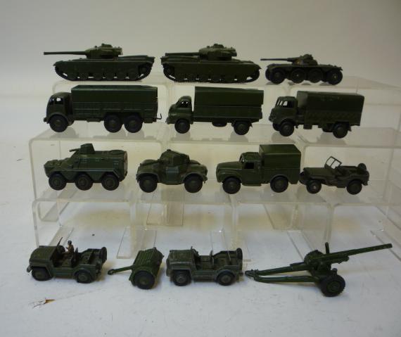 Diecast Vehicles. Two French Dinky 80A E.B.R. Panhard, 80B Jeep, and twelve English Dinky army