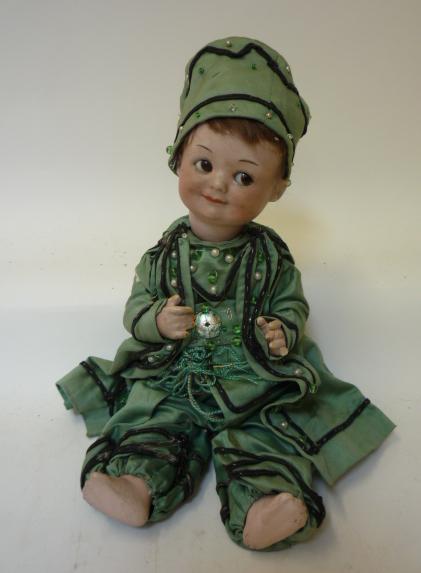 Dolls & Equipment. An Armand Marseille bisque head googly eyed doll with brown glass sleeping