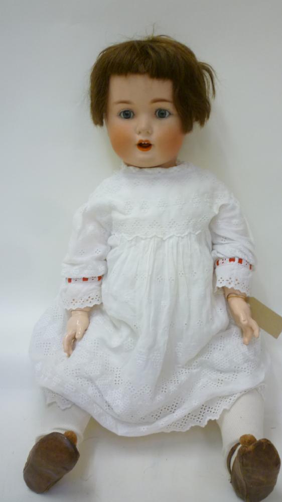 Dolls & Equipment. A Schutsmeister & Quendt bisque head toddler doll with blue glass sleeping