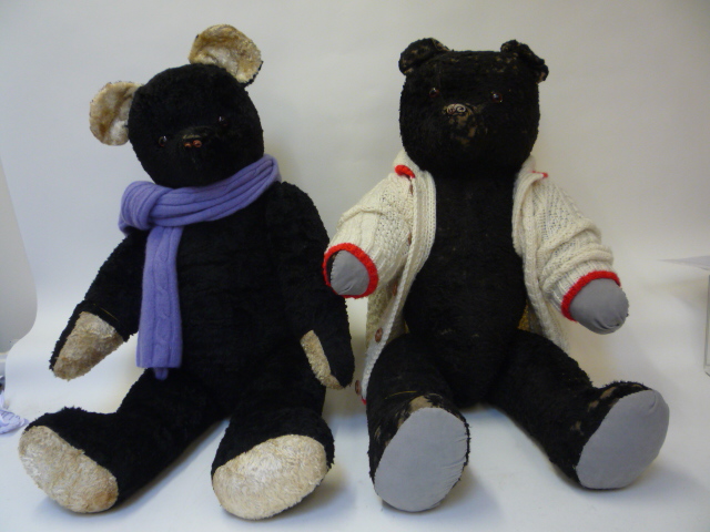 Teddies & Soft Toys. A large French teddy bear, early to mid 20th century, covered in black plush,
