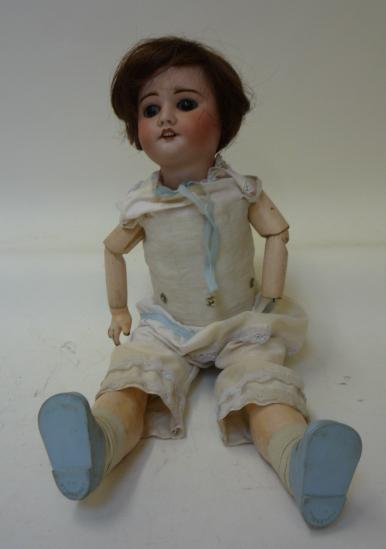 Dolls & Equipment. An S.F.B.J. bisque head girl doll with brown glass sleeping eyes, open mouth
