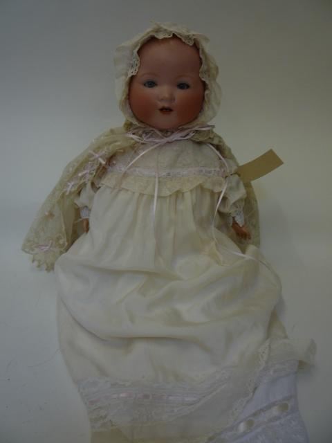 Dolls & Equipment. An Armand Marseille bisque head dream baby doll with blue glass sleeping eyes,