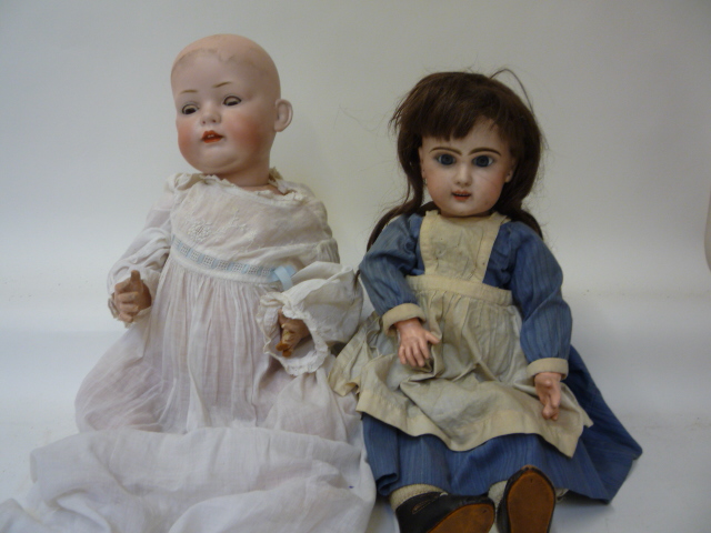 Dolls & Equipment. A German bisque head character doll, possibly Bahr & Proschild, with brown