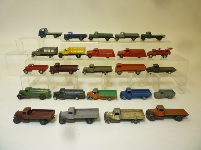 Diecast Vehicles. Twenty four Dinky small lorries and tankers, mainly early models, P-F