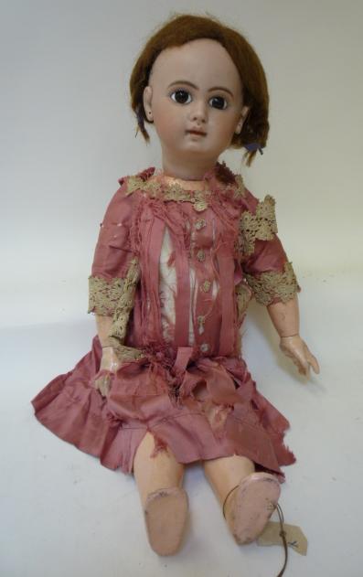 Dolls & Equipment. A Jumeau bisque head walking girl doll with fixed brown glass eyes, closed mouth,