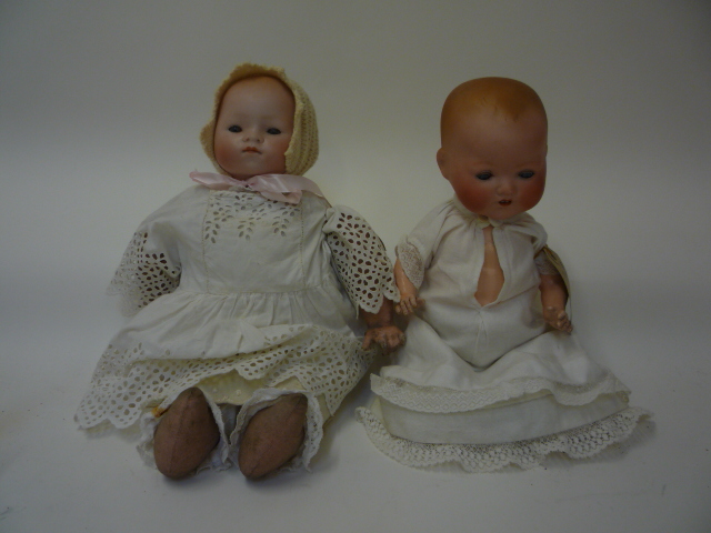 Dolls & Equipment. An Armand Marseille bisque head "dream baby" doll with blue glass sleeping