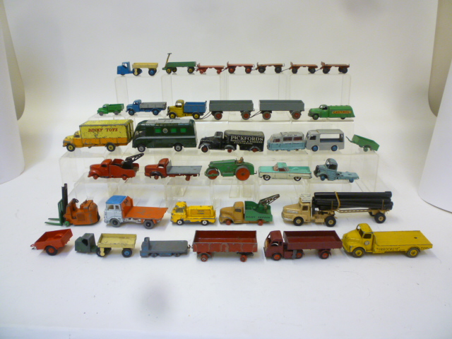 Diecast Vehicles. Twenty six various Dinky Commercial models, eight trailers and a Timpo "Pickfords"