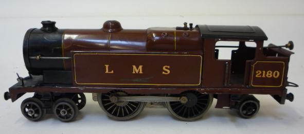 Model Railways. Hornby No 2 electric 4-4-2 L.M.S. tank locomotive in L.M.S. red, 2180 to bunker