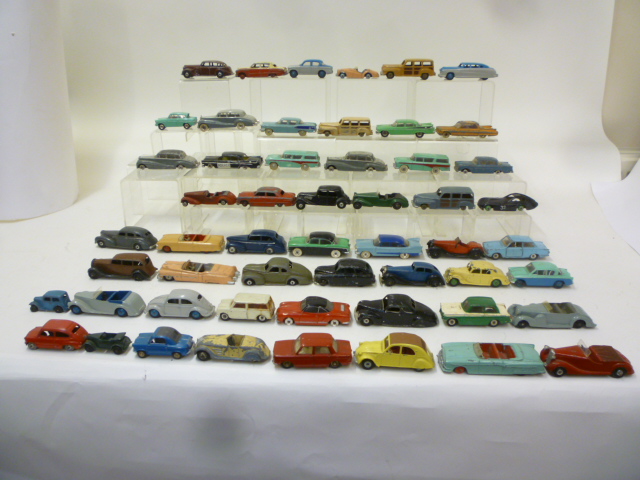 Diecast Vehicles. Fifty four Dinky cars including some early models, P-F