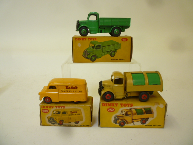 Diecast Vehicles. 411 Bedford Truck, mid-green, boxed, G, 480 Bedford CA van "Kodak", boxed, G,