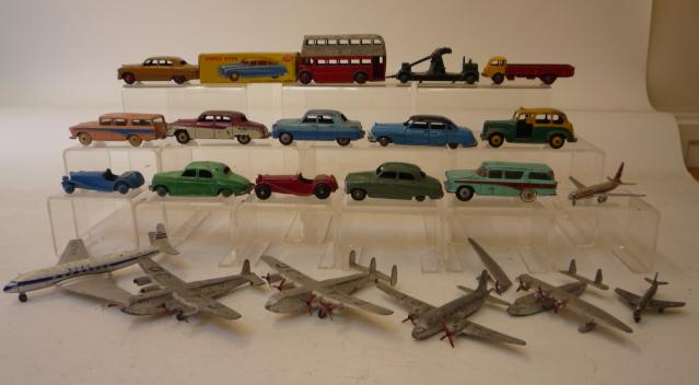 Diecast Vehicles. Ten Dinky cars, six planes, and five other items, playworn (21)