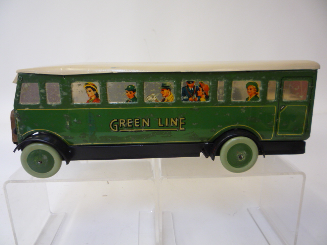 A Chad Valley single decker Greenline bus, painted aluminium, with solid windows, printed