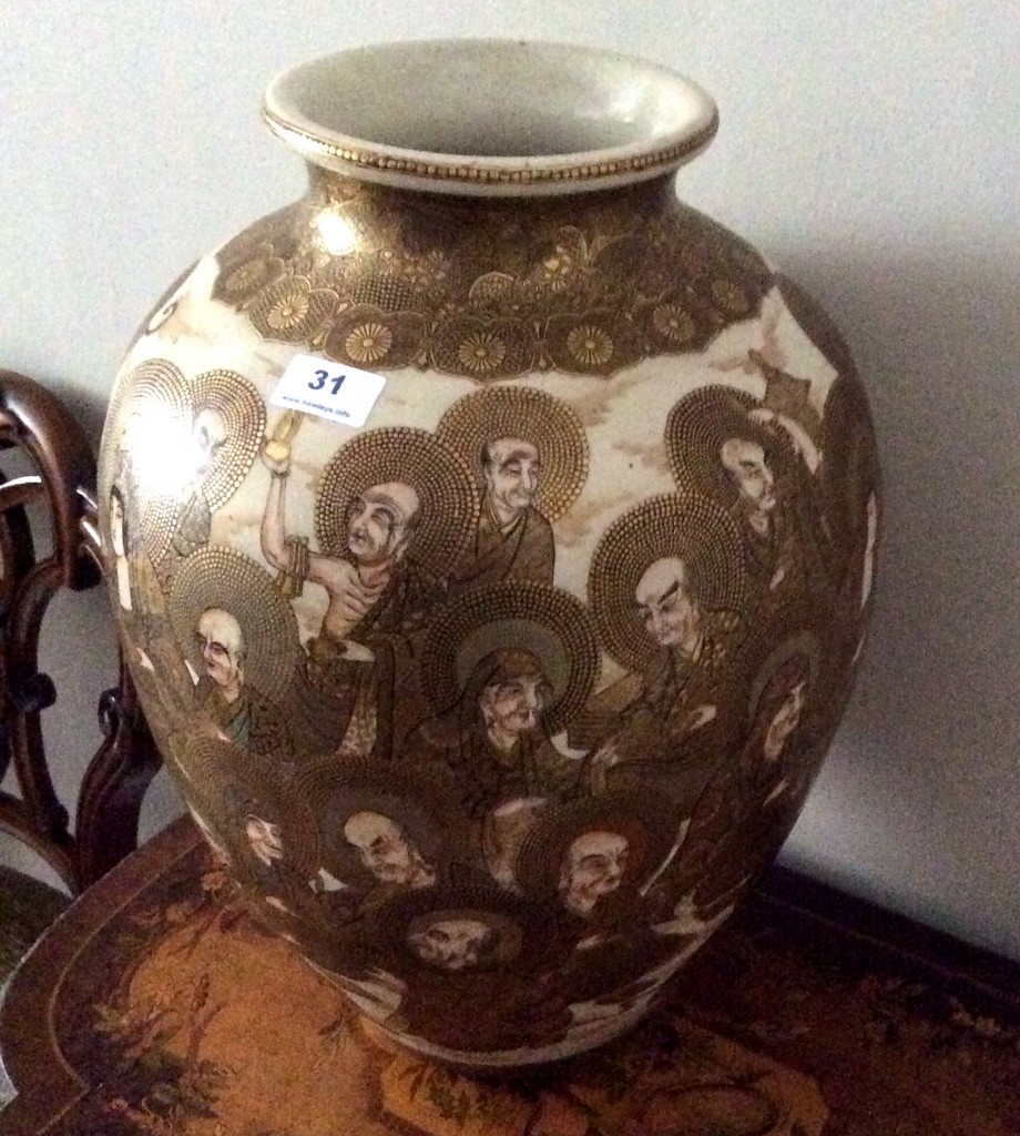Japanese satsuma pottery vase of good quality  decorated with a `thousand face` design.