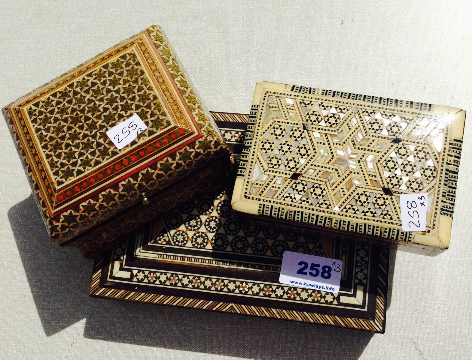 Three various inlaid mosaic work boxes.