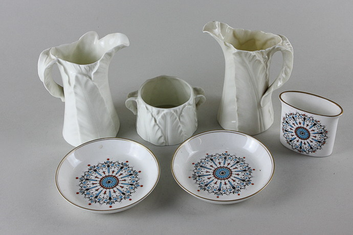 Two Royal Worcester leaf pattern jugs (1 a/f) and a matching sugar bowl (a/f), together with three