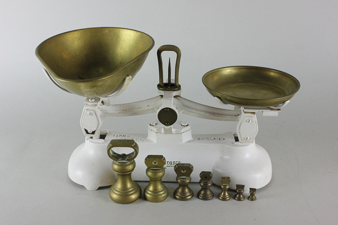 A set of Librascale Co balance scales with brass pans and some weights
