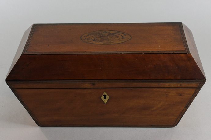 A George III satinwood tea caddy (now as a sewing box) with fitted interior and hinged top with