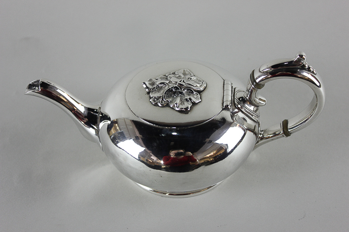 A small James Dixon plated Britannia metal teapot